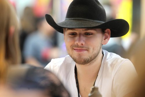 Country star Brett Kissel  smiles as he greets fans during the autograph session  at the Juno Fanfare at St. Vital Centre Saturday.   March 29, 2014 Ruth Bonneville / Winnipeg Free Press