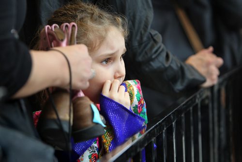 Seven year old Sarah Smith waits patiently in line with her mom and her pink cowboy books to get them signed by Dean Brody  at the Juno Fanfare at St. Vital Centre Saturday.   March 29, 2014 Ruth Bonneville / Winnipeg Free Press