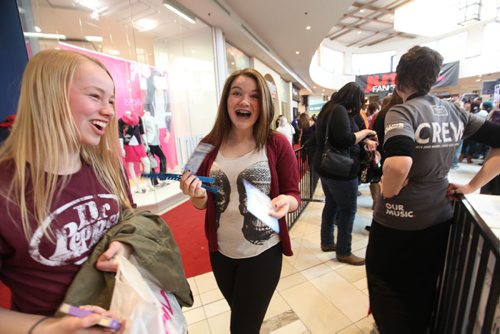 Sixteen year old Shianne Johnson can't hold back her excitement after winning tickets to the Juno's after winning a dance competition on stage at St. Vital Centre during Juno FanFare Saturday.  See story. March 29, 2014 Ruth Bonneville / Winnipeg Free Press