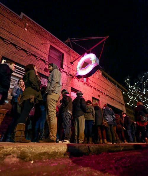 Dozens of fans line up outside The Pyramid Cabaret in hopes of getting in to see July Talk, Born Ruffians, and The Revival during JUNOfest in Winnipeg on Friday, March 28, 2014. (Photo by Crystal Schick/Winnipeg Free Press)