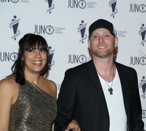 Amanda, left, and Tim Hicks on the JUNO green carpet at the RBC Convention Centre in Winnipeg on Saturday, March 29, 2014. (Photo by Crystal Schick/Winnipeg Free Press)