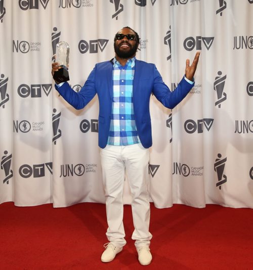 Exco Levi (and Kabaka Pyramid not pictured) wins the 2014 JUNO for Reggae Recording of the Year at the RBC Convention Centre in Winnipeg on Saturday, March 29, 2014. (Photo by Crystal Schick/Winnipeg Free Press)