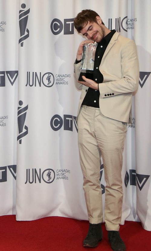 Ryan Hemsworth receives the 2014 JUNO for Electronic Album of the Year with Guilt Trip at the RBC Convention Centre in Winnipeg on Saturday, March 29, 2014. (Photo by Crystal Schick/Winnipeg Free Press)