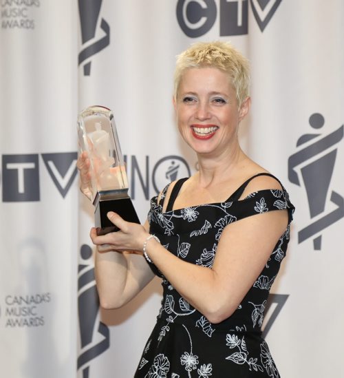 Helen Austin receives the 2014 JUNO for Children's Album of the Year with the album Colour It at the RBC Convention Centre in Winnipeg on Saturday, March 29, 2014. (Photo by Crystal Schick/Winnipeg Free Press)