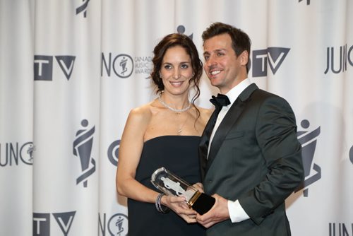 Chantal Kreviazuk, left, and Raine Maida, receive the 2014 JUNO Allan Waters Humanitarian Award at the RBC Convention Centre in Winnipeg on Saturday, March 29, 2014. (Photo by Crystal Schick/Winnipeg Free Press)