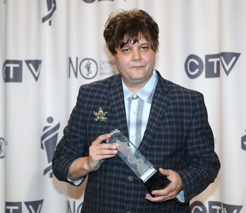 Ron Sexsmith receives the 2014 JUNO for Adult Alternative Album of the Year at the RBC Convention Centre in Winnipeg on Saturday, March 29, 2014. (Photo by Crystal Schick/Winnipeg Free Press)