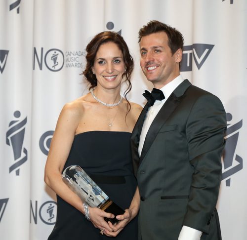 Chantal Kreviazuk, left, and Raine Maida, receive the 2014 JUNO Allan Waters Humanitarian Award at the RBC Convention Centre in Winnipeg on Saturday, March 29, 2014. (Photo by Crystal Schick/Winnipeg Free Press)