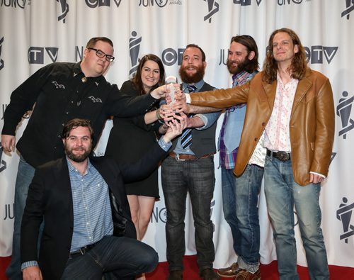 The Strumbellas receive the 2014 JUNO for group Roots and Traditional Album of the Year with the album We Still Move on Dance Floors at the RBC Convention Centre in Winnipeg on Saturday, March 29, 2014. (Photo by Crystal Schick/Winnipeg Free Press)