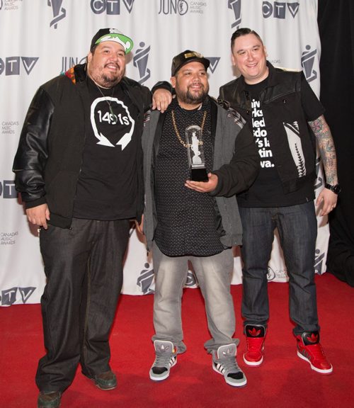 A Tribe Called Red receives the 2014 JUNO for Breakthrough Group of the Year at the MTS Centre in Winnipeg on Sunday, March 30, 2014. (Photo by Crystal Schick/Winnipeg Free Press)