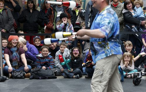stdup .Kids of all ages enjoy Festival of Fools and juggler  Mike Battie form North Vancouver performs  at Manitoba Children's Festival's   , Festival of Fools at the Forks Market with shows everyday from 11am to 3pm  including circus workshops ,performances clowns , activities and face painting   Mar. 31 2014 / KEN GIGLIOTTI / WINNIPEG FREE PRESS