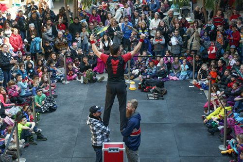 A daring performance at the 14th annual Festival of Fools at The Forks in Winnipeg on Tuesday, April 1, 2014. The free festival of foolishness runs Saturday, March 29 to Sunday, April 6. (Photo by Crystal Schick/Winnipeg Free Press)