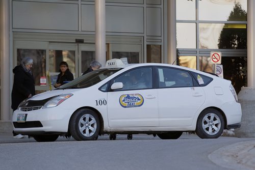 April 1, 2014 - 140401  -  A city cab waits for a customer at St. Boniface Hospital in Winnipeg Tuesday, April 1, 2014. John Woods / Winnipeg Free Press