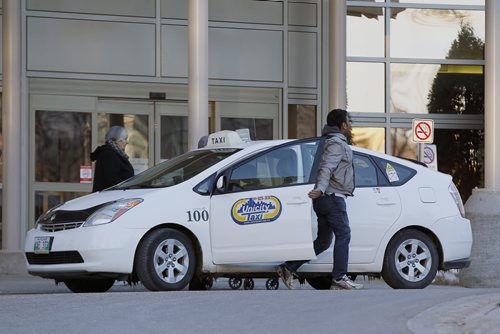 April 1, 2014 - 140401  -  A city cab waits for a customer at St. Boniface Hospital in Winnipeg Tuesday, April 1, 2014. John Woods / Winnipeg Free Press