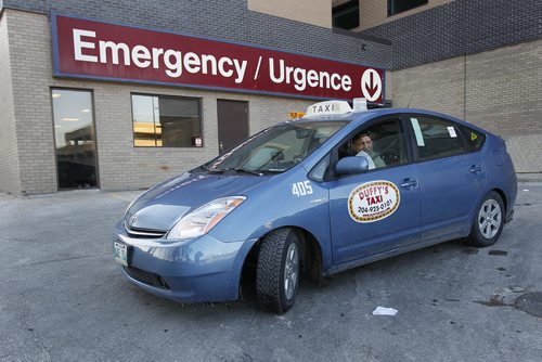 April 1, 2014 - 140401  -  A city cab waits for a customer at St. Boniface Hospital in Winnipeg Tuesday, April 1, 2014. John Woods / Winnipeg Free Press