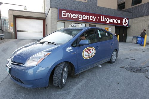 April 1, 2014 - 140401  -  A city cab waits for a customer at St. Boniface Hospital in Winnipeg Tuesday, April 1, 2014. John Woods / Winnipeg Free Press