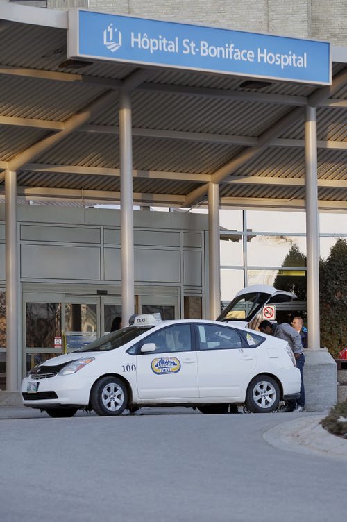 April 1, 2014 - 140401  -  A city cab waits for a customer at St. Boniface Hospital in Winnipeg Tuesday, April 1, 2014. John Woods / Winnipeg Free Press