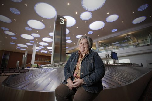 April 4, 2014 - 140404  -  Debbie Ristimaki, whose favourite place is the Winnipeg airport, is photographed in the airport Friday, April 4, 2014. John Woods / Winnipeg Free Press  Re: Our Winnipeg story