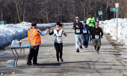 Runners take part in the MEC Winnipeg 2014 Race Series five and ten kilometer race in the Assiniboine Park Sunday morning. It's the first in a series of five races which will take place over the course of the year.  140406 April 06, 2014 Mike Deal / Winnipeg Free Press