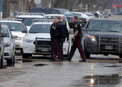 Shooting scene in the 600 block of Manitoba near McKenzie. BORIS MINKEVICH / WINNIPEG FREE PRESS April 7, 2014
