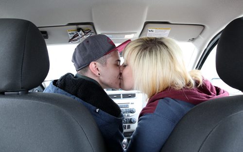 Jeremy Barbosa with his girlfriend Ashley Koop kiss at Assiniboine Park-feature on Life as a young, transgender person-    See Red River College CreCom story- Feb 07, 2014   (JOE BRYKSA / WINNIPEG FREE PRESS)
