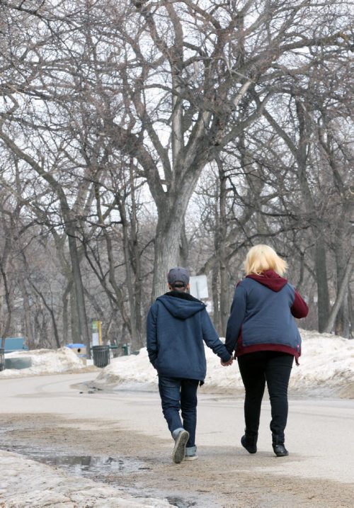 Jeremy Barbosa with his girlfriend Ashley Koop at Assiniboine Park-feature on Life as a young, transgender person-    See Red River College CreCom story- Feb 07, 2014   (JOE BRYKSA / WINNIPEG FREE PRESS)