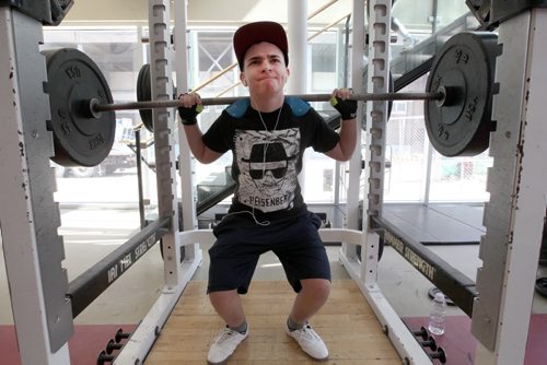 Jeremy Barbosa works out at UofW Bill Wedlake Fitness Centre- RRCC feature on Life as a young, transgender person-    See Red River College CreCom story- Feb 07, 2014   (JOE BRYKSA / WINNIPEG FREE PRESS)
