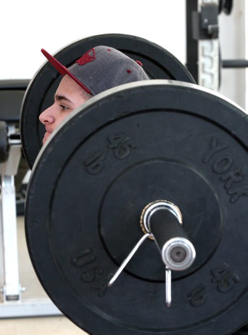 Jeremy Barbosa works out at UofW Bill Wedlake Fitness Centre- RRCC feature on Life as a young, transgender person-    See Red River College CreCom story- Feb 07, 2014   (JOE BRYKSA / WINNIPEG FREE PRESS)