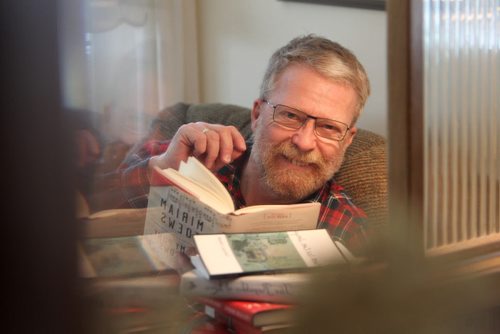 Duncan McMonagle reads a book by one of his favourite writers Miriam Toews as he muses about a living in a mystical world of literature which is his favourite place to be. Pictures to go with a  Our Winnipeg, feature for Sunday Extra -  april 13. April 08  2014 Ruth Bonneville / Winnipeg Free Press