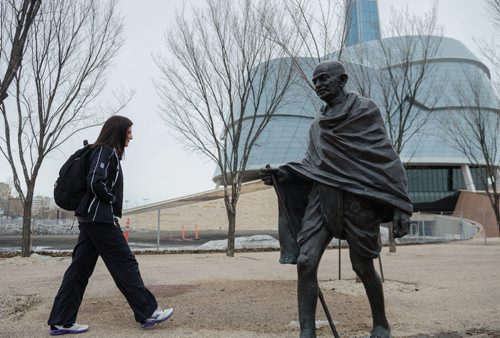 Dr. Adrienne Leslie-Toogood takes a walk past the Canadian Museum for Human Rights.  Leslie-Toogood is the director of sports psychology at the Canadian Sport Centre Manitoba and often walks to maintain good health.  EMILY CUMMING / WINNIPEG FREE PRESS APRIL 9, 2014