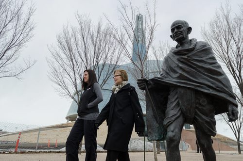 Dr. Adrienne Leslie-Toogood (L) and her mother Jodi takes a walk past the Canadian Museum for Human Rights.  Leslie-Toogood is the director of sports psychology at the Canadian Sport Centre Manitoba and often walks to maintain good health.  EMILY CUMMING / WINNIPEG FREE PRESS APRIL 9, 2014