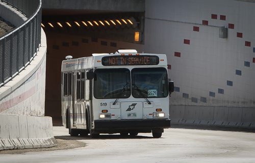 City of Winnipeg Rapid Transit buses arrive and depart from the Osborne Street Station Thursday afternoon. 140410 - Thursday, April 10, 2014 -  (MIKE DEAL / WINNIPEG FREE PRESS)