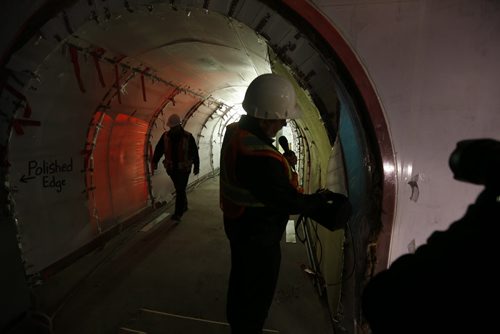 Don Peterkin COO of the Assiniboine Park Conservancy  show 7 in acrylic  thick glass tunnel for viewing the polar bears in their under water pool during Journey to Churchill final tour of the 10 acre  construction  site  prior to the summer opening April 11 2014 / KEN GIGLIOTTI / WINNIPEG FREE PRESS