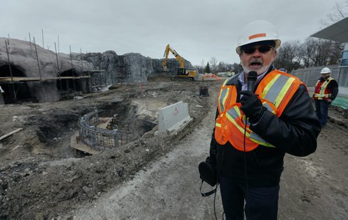 Don Peterkin COO of the Assiniboine Park Conservancy leads Journey to Churchill final tour of the 10 acre  construction  site  prior to the summer opening . The polar bear exhibit area has cave opening with plexiglass viewing area to watch the bears in the outdoor environment .  April 11 2014 / KEN GIGLIOTTI / WINNIPEG FREE PRESS