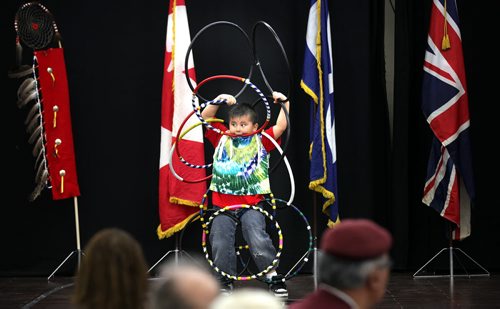 Six year old kindergarden student Phoenix Desjarlais  struts his stuff Friday afternoon at the 18th ANNUAL Winnipeg Police Service NORTH END SPRING FEAST. The six year old also is one of William Whyte's star square dancers. See release April 11, 2014 - (Phil Hossack / Winnipeg Free Press)