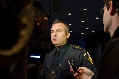 Constable Jason Michalyshen speaks to media about the arrest of Michel Werrier, 38, and an unnamed 39-year-old woman, both of whom are facing numerous charges, including Break Enter and Commit, Theft under $5000.00 and Possess Goods Obtained by Crime under $5000.00.   Michalyshen also spoke about a 19-year-old male who was assaulted in a bus shelter near Fort Street and Graham Avenue on April 11 at 1:10 a.m. EMILY CUMMING / WINNIPEG FREE PRESS APRIL 11, 2014
