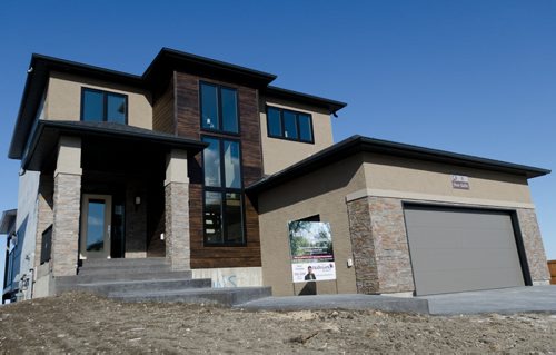 Exterior of 8 Stan Bailie Drive in South Pointe.  EMILY CUMMING / WINNIPEG FREE PRESS APRIL 14, 2014