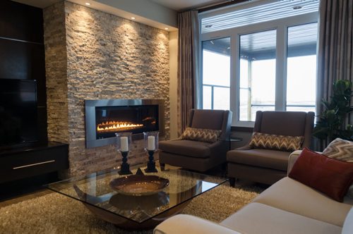 Main floor living room featuring fireplace at 8 Stan Bailie Drive in South Pointe.  EMILY CUMMING / WINNIPEG FREE PRESS APRIL 14, 2014