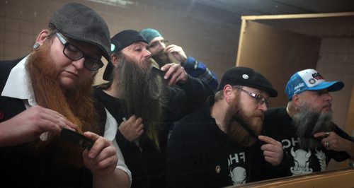 Members "primp" before an evening meeting of the Manitoba Facial Hair Club. See Dave Sanderson story. April 14, 2014 - (Phil Hossack / Winnipeg Free Press)