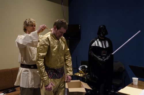 Derek Zeilstra as "Luke Moonwalker" helps Graham Hunt into a C-3PO costume backstage at the Church of the Rock, as Darth Vader looks on.  The Star Wars themed Easter service is expected to attract between 5-6 thousand spectators this weekend to the Church.  Each year the church takes a different pop culture story and adapts it to tell the story of the resurrection of Jesus Christ.  EMILY CUMMING / WINNIPEG FREE PRESS APRIL 15, 2014