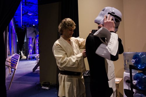Derek Zeilstra as "Luke Moonwalker" helps Isaac Buecker into a Stormtrooper costume backstage at the Church of the Rock.  The Star Wars themed Easter service is expected to attract between 5-6 thousand spectators this weekend to the Church.  Each year the church takes a different pop culture story and adapts it to tell the story of the resurrection of Jesus Christ.  EMILY CUMMING / WINNIPEG FREE PRESS APRIL 15, 2014