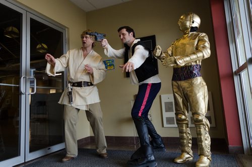 Christian actors strike a pose in advance of "Rock Star Wars."  From left, Derek Zeilstra as "Luke Moonwalker", Pastor Tim Hamm as "Solo" and Graham Hunt as C-3PO.  The Star Wars themed Easter service is expected to attract between 5-6 thousand spectators this weekend to the Church of the Rock.  Each year the church takes a different pop culture story and adapts it to tell the story of the resurrection of Jesus Christ.  EMILY CUMMING / WINNIPEG FREE PRESS APRIL 15, 2014