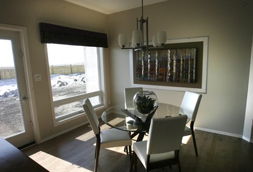 Homes. A condo at 5 Casselman Crescent, in the Randall Homes new condo development in Oak Bluff West, Oakwood Estates.   The dining area. Todd Lewys story. Wayne Glowacki / Winnipeg Free Press April 16   2014