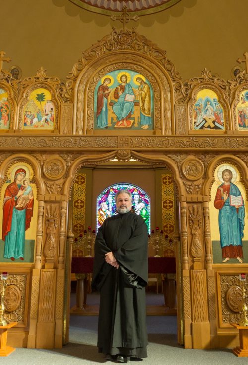 Father Michael Kwiatkowski poses for a photo in the Holy Eucharist Ukrainian Catholic Church in Winnipeg on Tuesday, April 8, 2014. (Photo by Crystal Schick/Winnipeg Free Press/Winnipeg Free Press)