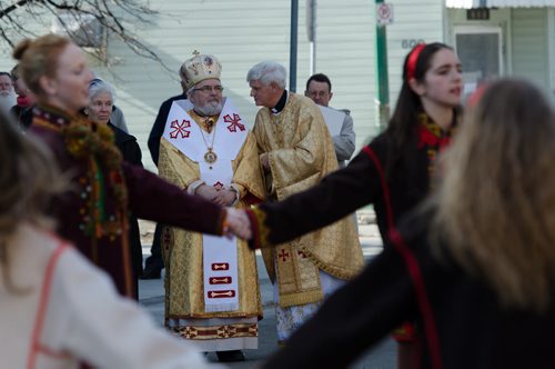 Ukrainian dancers perform outside of the Sts. Vladimir & Olga Metropolitan Cathedral on Easter Sunday while the Metropolitan Archbishop the Most Rev. Lawrence Huculak (left) and Rt. Rev. Msgr. Mitrat Michael Buyachok (right) look on.  The dancers are part of the Plast dance group and the Ukrainian Youth Association.  EMILY CUMMING / WINNIPEG FREE PRESS APRIL 20, 2014