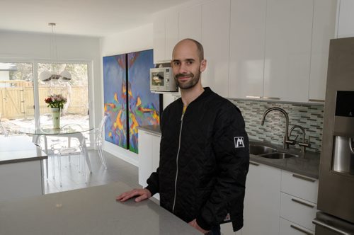 Ivan Plett, project manager for Rempel Builders, poses for a photo in a kitchen that was recently renovated.  EMILY CUMMING / WINNIPEG FREE PRESS