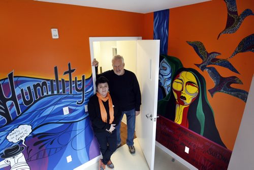 Sandy Staples, Senior Youth Care Practitioner with Paul Johnston, recently retired as Macdonald Youth Services (MYS) Director of Client Services in one of the bedrooms of the MYS Youth Resource Centre and Emergency Shelter located at 159 Mayfair Ave. The renovated 7,000 square foot mansion was built in 1903 by railway and hotel magnate J.D. McArthur. Wanda Luna, an interdisciplinary indigenous artist born in Chile painted the murals in the bedrooms. Carol Sanders story  Wayne Glowacki / Winnipeg Free Press April 22   2014