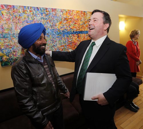 (right) Kenney welcomes   newly arrived immigrant from India Satnam  Dolla  , Minister Kenney is in Winnipeg today and will tour the Immigrant Centre  At the end of his tour, he will have new things to say on the settlement dispute with former Minister Melnick from a year ago.Ä®APRIL 23 2014 / KEN GIGLIOTTI / WINNIPEG FREE PRESS