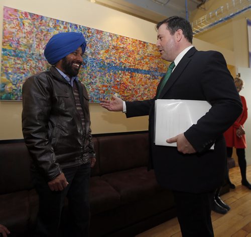 Kenney welcomes  newly arrived immigrant from India Satnam  Dolla  , Minister Kenney is in Winnipeg today and will tour the Immigrant Centre  At the end of his tour, he will have new things to say on the settlement dispute with former Minister Melnick from a year ago.Ä®APRIL 23 2014 / KEN GIGLIOTTI / WINNIPEG FREE PRESS