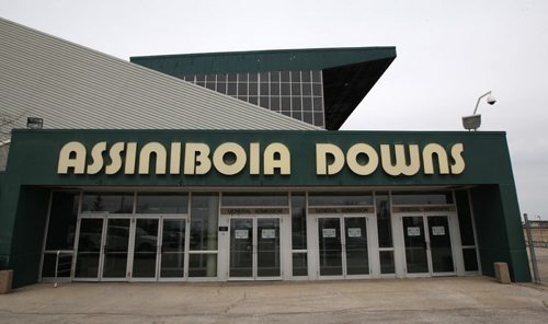 Assiniboia Downs CEO Darren Dunn, not pictured, announced today The government of Manitoba and the Manitoba Jockey Club have reached a comprehensive agreement that resolves all matters outstanding between them regarding the continuation of live horse racing at Assiniboia Downs.   Here a better watches simulcast horse racing at the Race Book at the Downs-See  Paul Wiecek story- Apr 23, 2014   (JOE BRYKSA / WINNIPEG FREE PRESS)