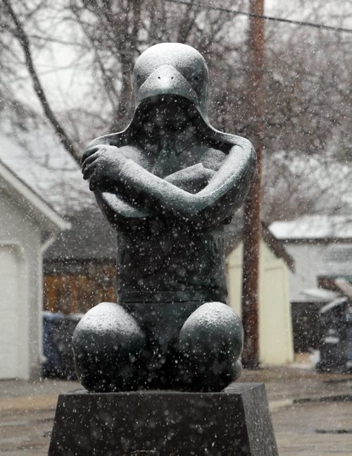 WEATHER STANDUP - Some sculptures get covered with snow in front of Loch Gallery at 306 St Mary's Rd. BORIS MINKEVICH / WINNIPEG FREE PRESS April 24, 2014